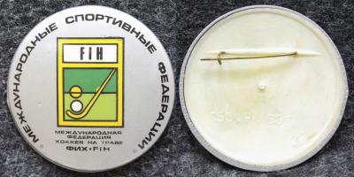 Знак Международная федерация хоккея на траве
